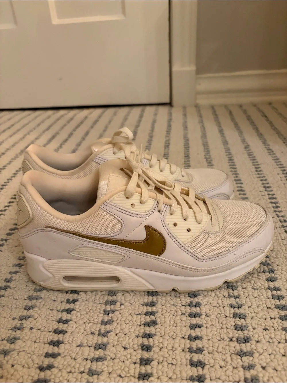 Nike Women’s Cream Sneakers with Gold Swoosh